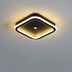 Modern square LED ceiling light with black metal frame and warm white glow on gray ceiling.