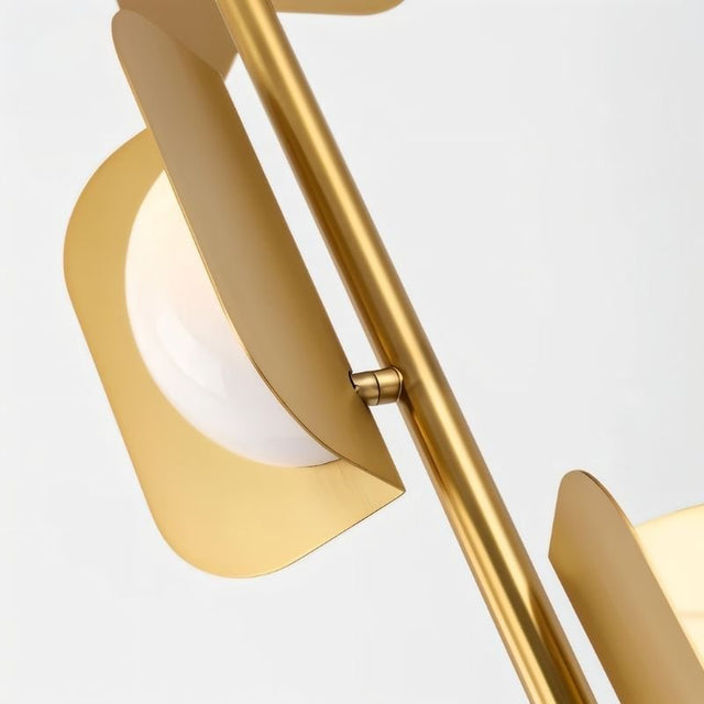 "A close-up detail of the gold floor lamp's acrylic shade."