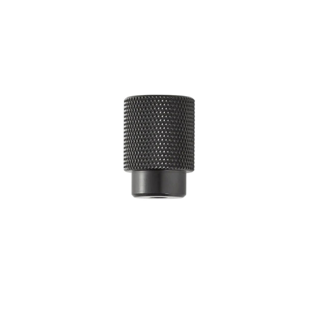 "Small knurled brass knob with a cylindrical grip and clean edges, suitable for modern cabinetry and drawers."