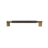 "A knurled brass pull bar with clean edges, blending industrial design and functionality for modern spaces."