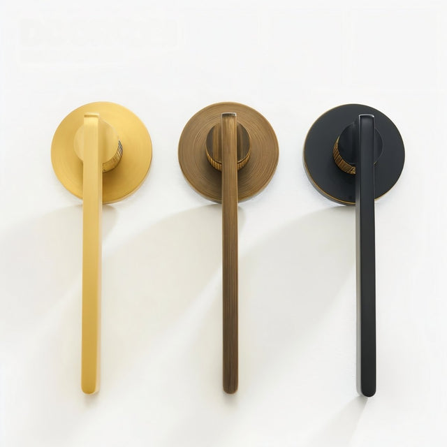 Top view of Sabaat Handle and Lock in gold, bronze, and black finishes, showcasing color options for interior door hardware.