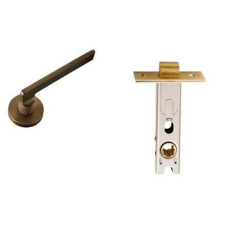 Sabaat Handle and Lock in bronze with latch mechanism, designed for classic interior door aesthetics.