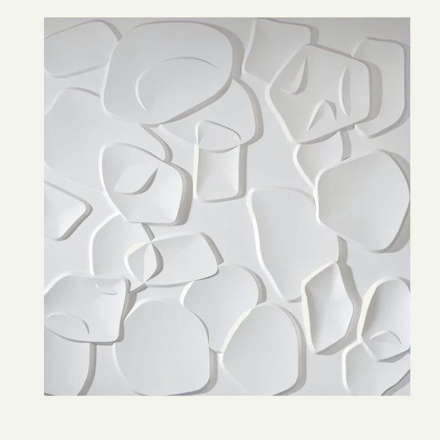 Single white Sabit PVC Wall Panel with 3D abstract shapes, ideal for waterproof and mold-proof home wall decoration.