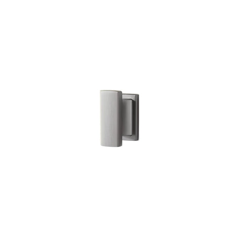 "Silver zinc alloy knob with angular design, isolated on a white background."