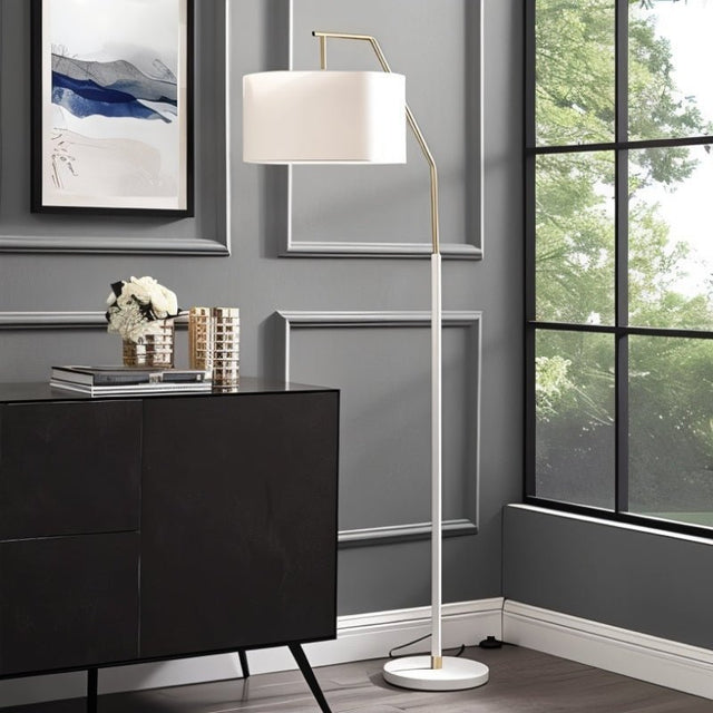 "Sleek white iron floor lamp with a gold accent and fabric drum shade, designed to add modern elegance and soft, diffused light to any room."
