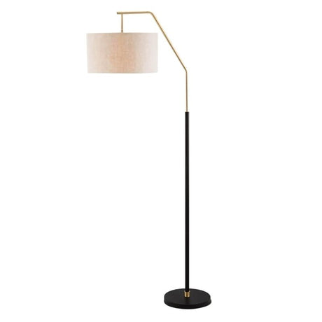 "Black iron floor lamp with a gold accent and fabric drum shade, showcasing a sleek, modern design for contemporary spaces."