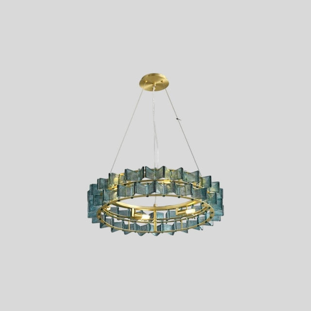 "Round iron Salane chandelier with layered blue glass elements, isolated on a light grey background."