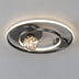 Modern black metal ceiling light with integrated LED ring and crystal accent sphere on white background.