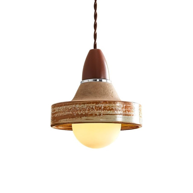 "Handcrafted pendant light with a textured ceramic shade and wooden top, blending rustic and modern styles."