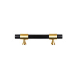 "A luxurious black marble handle with polished brass accents, ideal for contemporary and classic interiors."