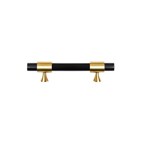 "A luxurious black marble handle with polished brass accents, ideal for contemporary and classic interiors."