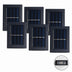 Six black solar wall lights with blue solar panels and white accent bars arranged in two rows.