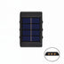 Black solar wall lamp with blue solar panel and three integrated LED lights, isolated on white background.