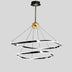Modern round chandelier with two tiered chrome rings and gold canopy suspended from ceiling against white background.