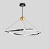 Modern round chandelier with polished chrome finish and brass sphere accent suspended from ceiling.