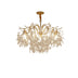 Gold-finished crystal chandelier with cascading leaf-shaped crystal drops and curved brass arms, displayed against a white background.