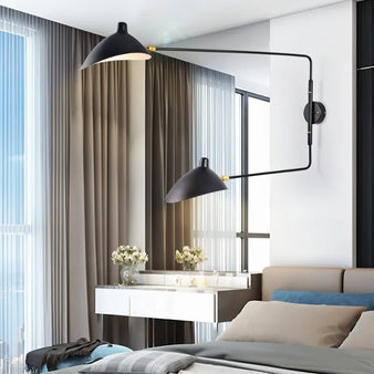 "Shifa Ceiling Lamp with adjustable arms and minimalist lampshades in a modern bedroom, made from aluminum, copper, and iron, providing stylish directional lighting."