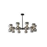 "Black iron Silvine chandelier with smoked glass spherical shades, angled view isolated on a white background."