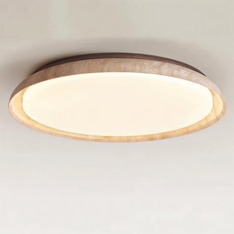 "Close-up of a minimalist ceiling light with a soft yellow travertine ring and acrylic diffuser, emitting a soft, even glow."
