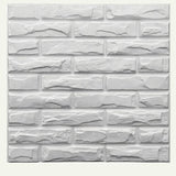 Someni Wall Panel with a white faux brick texture, ideal for adding a rustic yet modern look to interior walls.