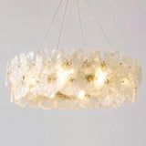 "A ring chandelier with handcrafted glass petals isolated on a white background."