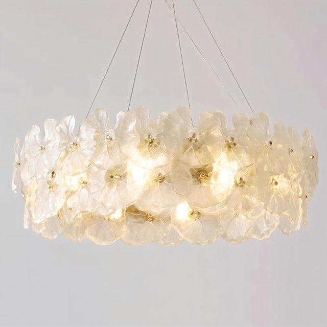 "A ring chandelier with handcrafted glass petals isolated on a white background."