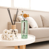 Svetu Waterproof Rechargeable Pendant Table Lamp in mint green on a white table, styled with flowers for modern indoor living room lighting.