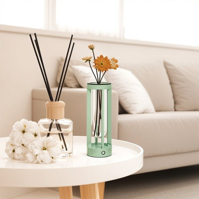 Svetu Waterproof Rechargeable Pendant Table Lamp in mint green on a white table, styled with flowers for modern indoor living room lighting.