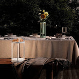 Outdoor dining setup with two Svetu Waterproof Rechargeable Pendant Table Lamps in white and green, ideal for ambient lighting and decor.