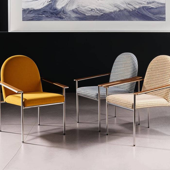 Sylvan Mid-Century Modern Accent Chair: Embracing iconic mid-century design elements, this accent chair showcases a streamlined silhouette, angled wooden legs, and retro-inspired upholstery patterns, offering both style and comfort in any room.