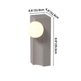 Small Teral Table Lamp with dimensions 9.9 x 4.6 inches, featuring concrete base and glowing glass globe for compact ambient lighting.