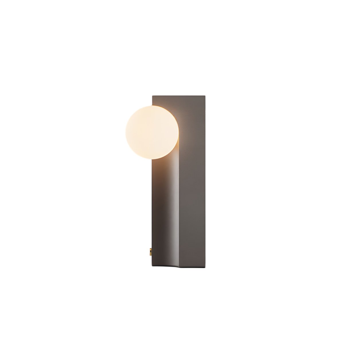 Side view of Teral Table Lamp with glowing glass globe and sleek concrete body, perfect for modern ambient lighting setups.
