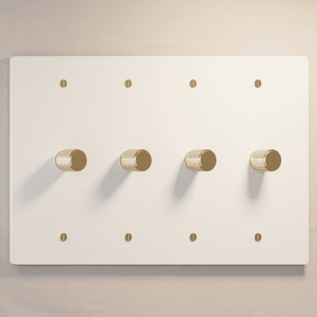 Four-gang white rotary dimmer switch with gold finish knobs, part of The Brass 3-Way Rotary Dimmer Switch Open Box series.