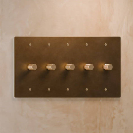 Five-gang The Brass Dimmer Switch - Open Box in brushed brass, offering high-end lighting control for large rooms.