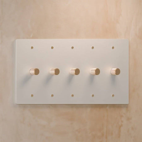 Five-gang The Brass Dimmer Switch - Open Box in white and brass, designed for elegant multi-light control.