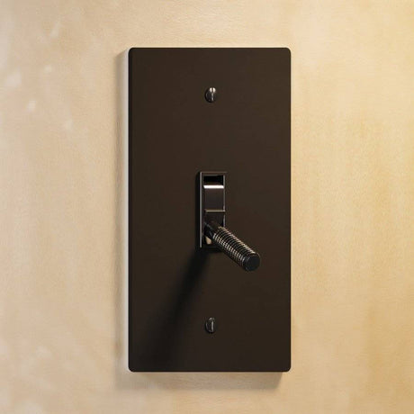 Single gang The Brass Toggle Switch (1 to 5 Gang) - Open Box in dark bronze with knurled toggle, blending vintage and modern aesthetics.