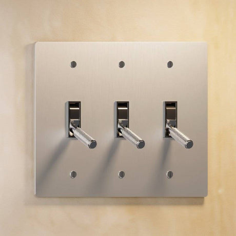 Triple gang The Brass Toggle Switch (1 to 5 Gang) - Open Box in brushed nickel with silver toggles, perfect for modern home lighting.