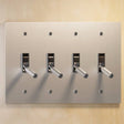 Four-gang The Brass Toggle Switch (1 to 5 Gang) - Open Box in nickel finish, offering a minimalist look for multi-light control.