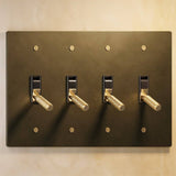 Four-gang The Brass Toggle Switch (1 to 5 Gang) - Open Box in aged brass finish, ideal for traditional or industrial-style lighting.