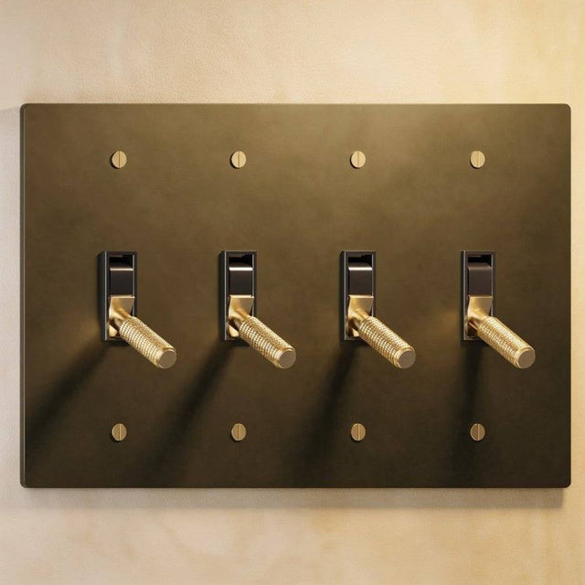 Four-gang The Brass Toggle Switch (1 to 5 Gang) - Open Box in aged brass finish, ideal for traditional or industrial-style lighting.