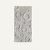 Tian Wall Panel in light gray concrete with circular crater-like textured surface design.