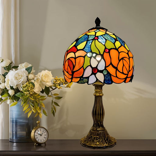 Tiffany Dragonfly Table Lamp: Inspired by the delicate wings of dragonflies, this table lamp features colorful stained glass panels with dragonfly motifs, adding whimsy and charm to your decor.