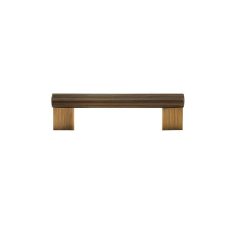 "Full view of a modern antique brass pull bar with a sleek ribbed texture, ideal for cabinet doors, drawers, and wardrobe panels."