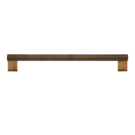 "A modern antique brass pull bar with a sleek ribbed texture, ideal for cabinet doors, drawers, and wardrobe panels in modern and transitional interiors."