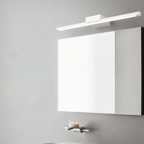 "Modern wall lamp providing uniform illumination above a bathroom vanity mirror."