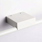 "Close-up of the Tovian wall lamp mount, showing its minimalist design and secure attachment."