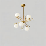 "A 6-light modern sputnik chandelier with spherical glass shades and a copper frame."