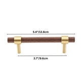 "dark wood pull bar with brass accents and a 14cm length, modern cabinet hardware."