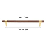 "dark wood pull bar with polished brass details, 23cm length for smaller drawers and doors."