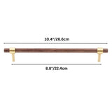 "dark wood pull bar with a 26cm length and brass mounts, suitable for mid-sized cabinetry."